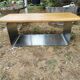 Designer coffee table in brushed stainless steel and light-tinted solid oak top