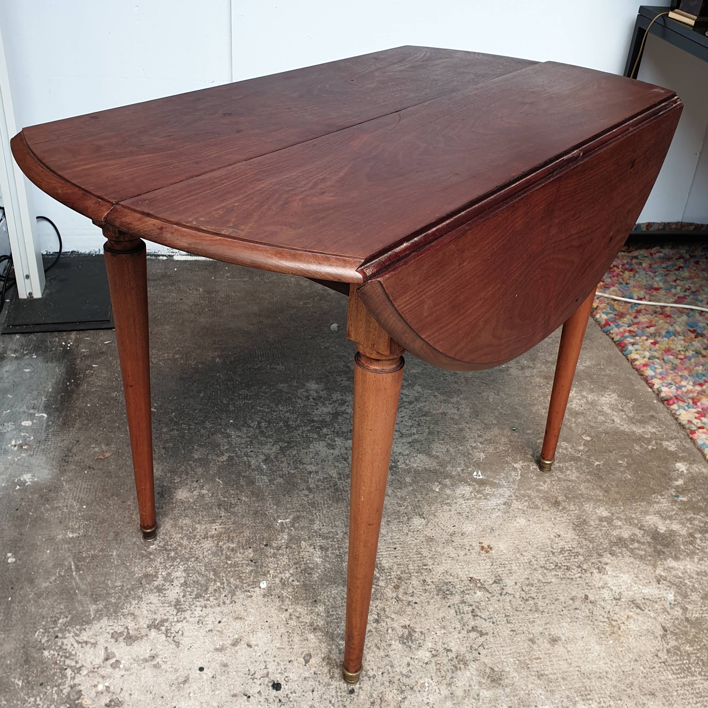 Old mahogany-shuttered round table