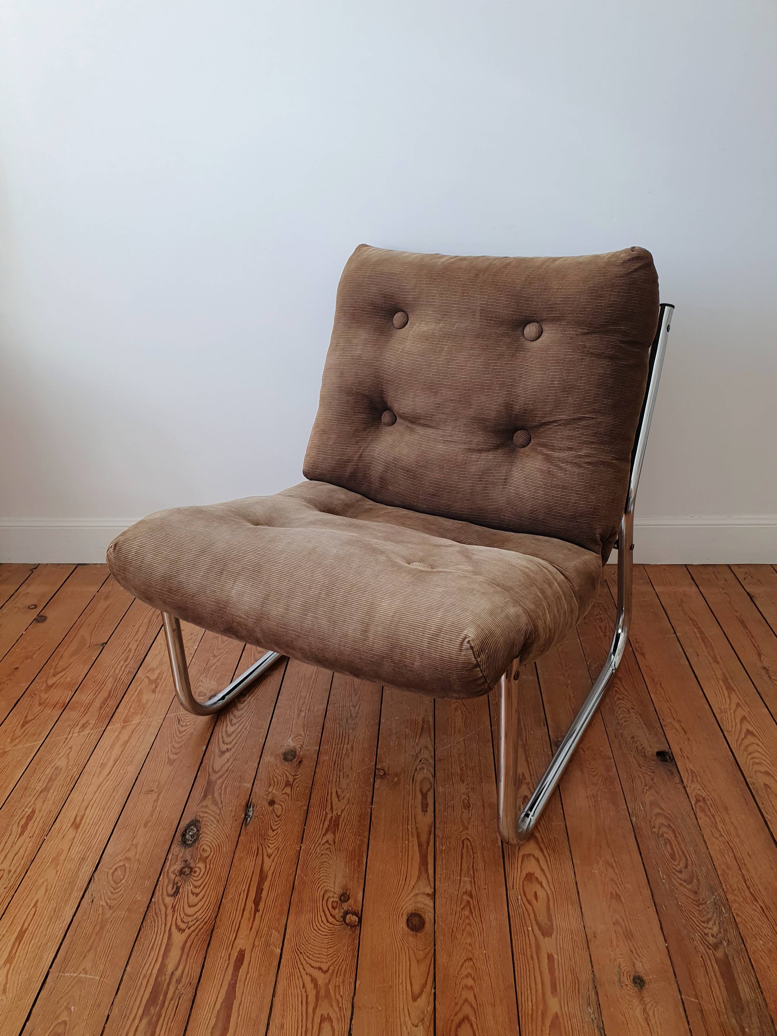 Vintage tubular chrome and velvet armchair