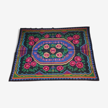 Floral handwoven green and fuchsia rug