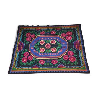 Floral handwoven green and fuchsia rug