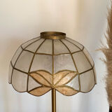 Table lamp with a vintage mother-of-pearl lampshade set and a golden foot