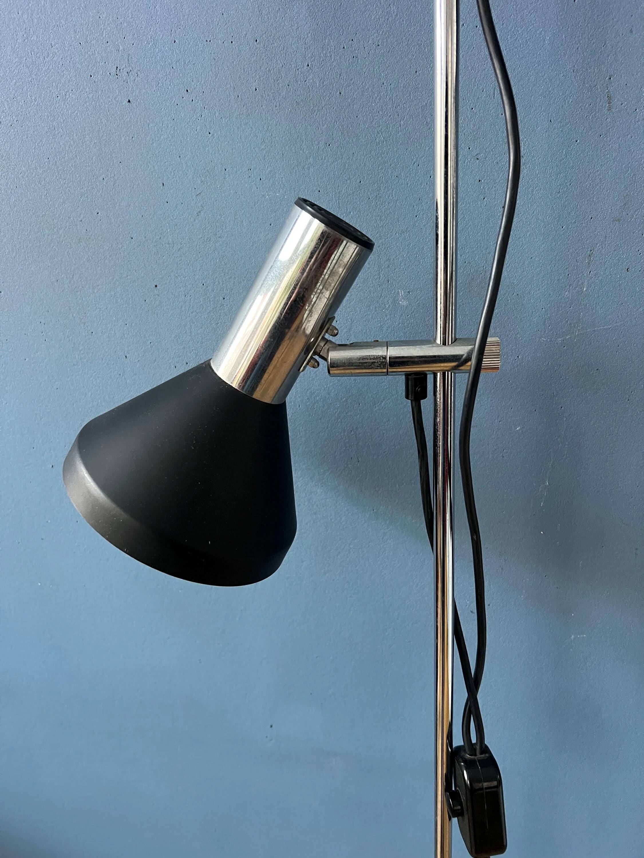 Mid-century black vintage floor lamp with two aluminium spots.