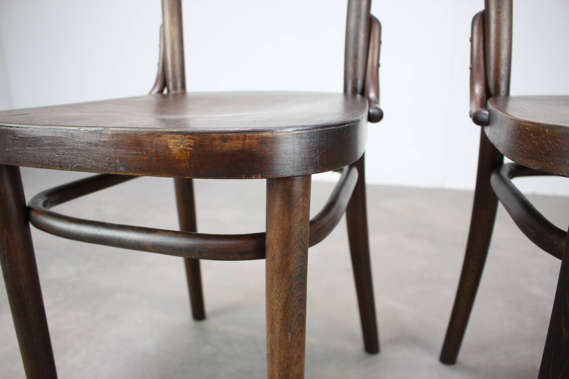 Pair of antique armchairs Model No B28 by Thonet, bent wood and caning, Austria 1920s.