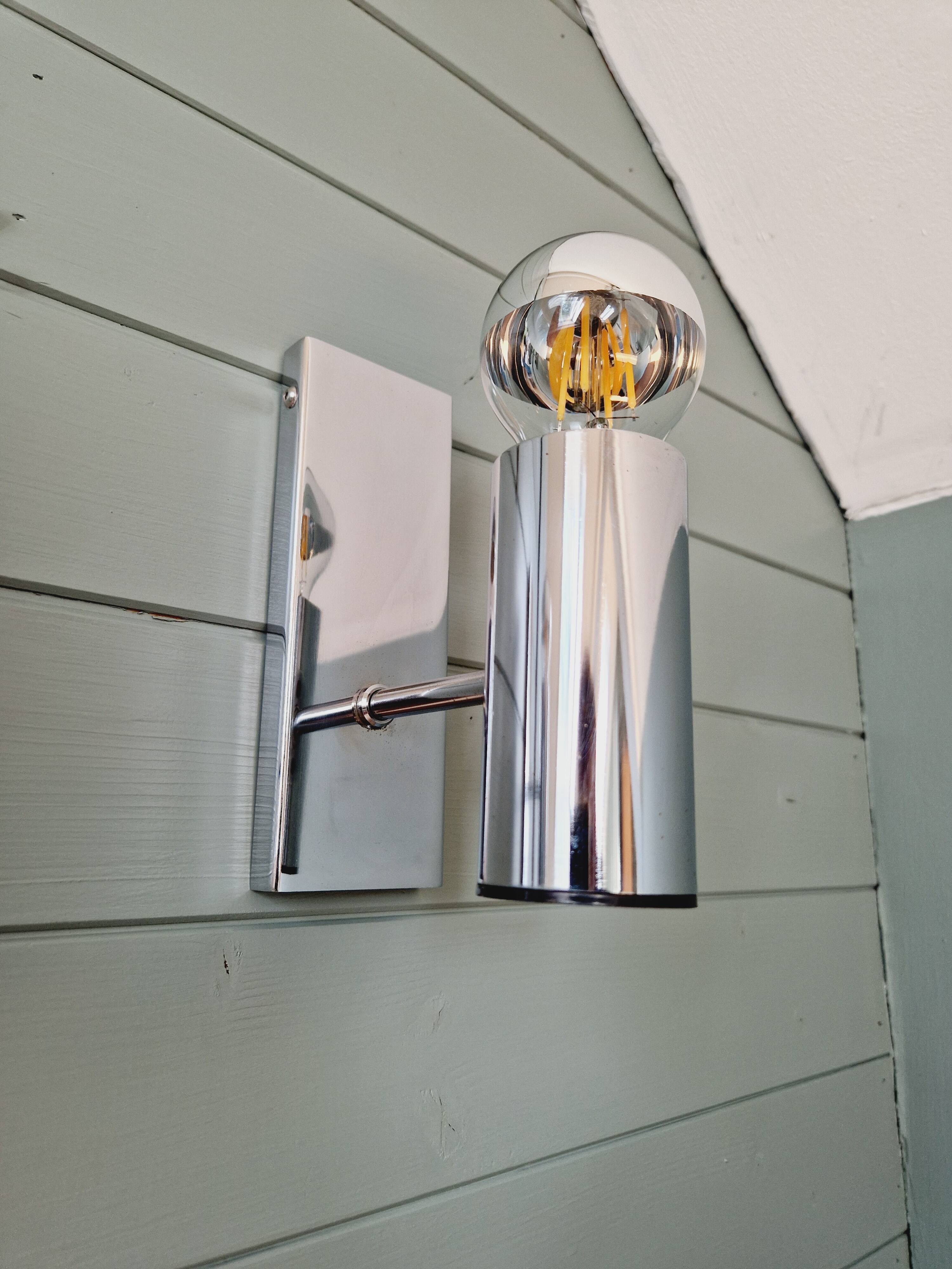 Pair of tubular chrome-plated metal wall sconces, 1970s