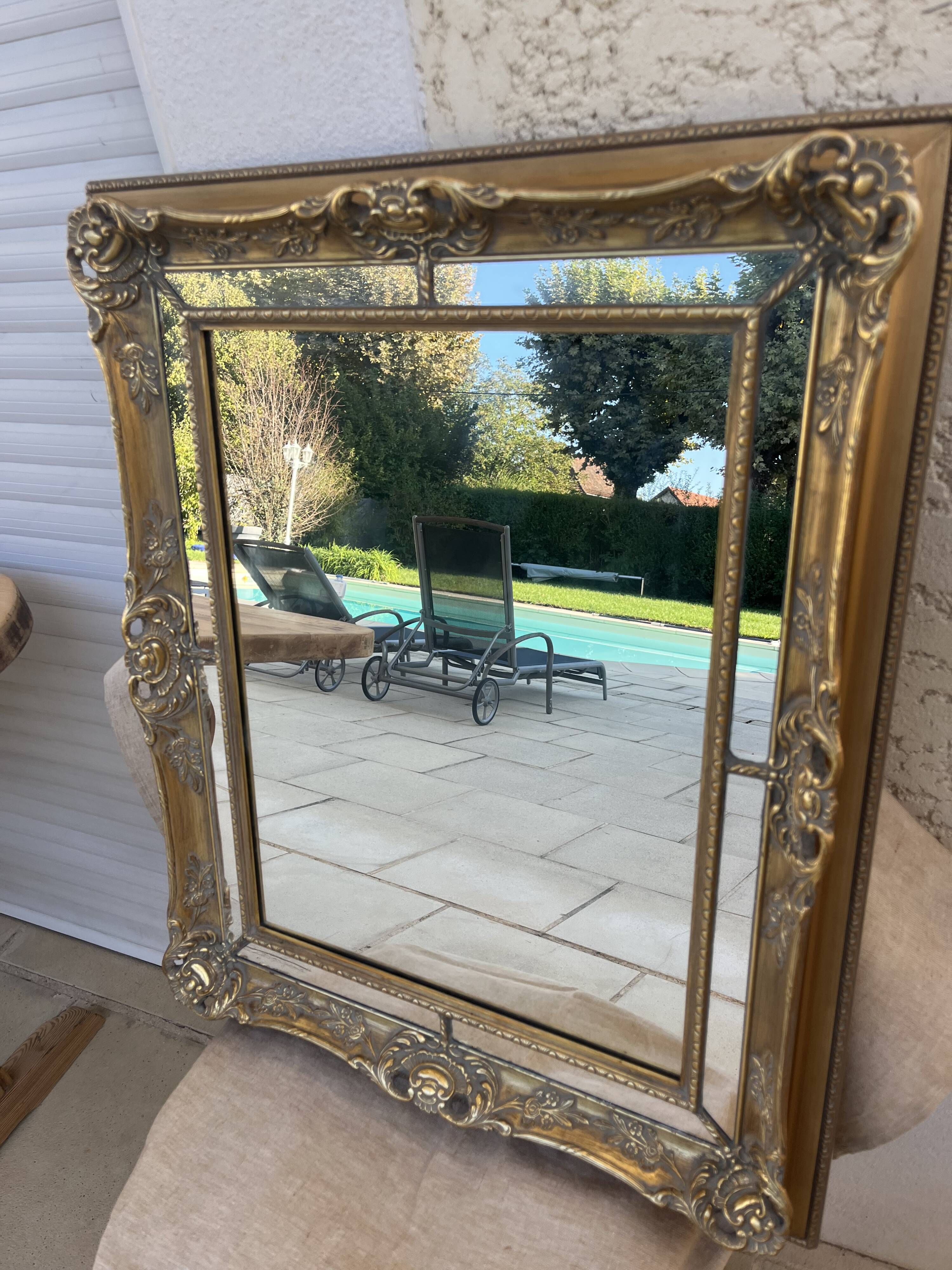 Golden mirror with a closed pore.