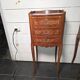 Pair of Louis XV style bedside tables in marquetry.