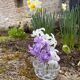Medium-sized antique flower holder in transparent moulded glass, vintage.