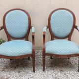 Paire de fauteuils médaillon style Louis XVI