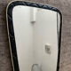 Asymmetrical mirror from the 1960s.