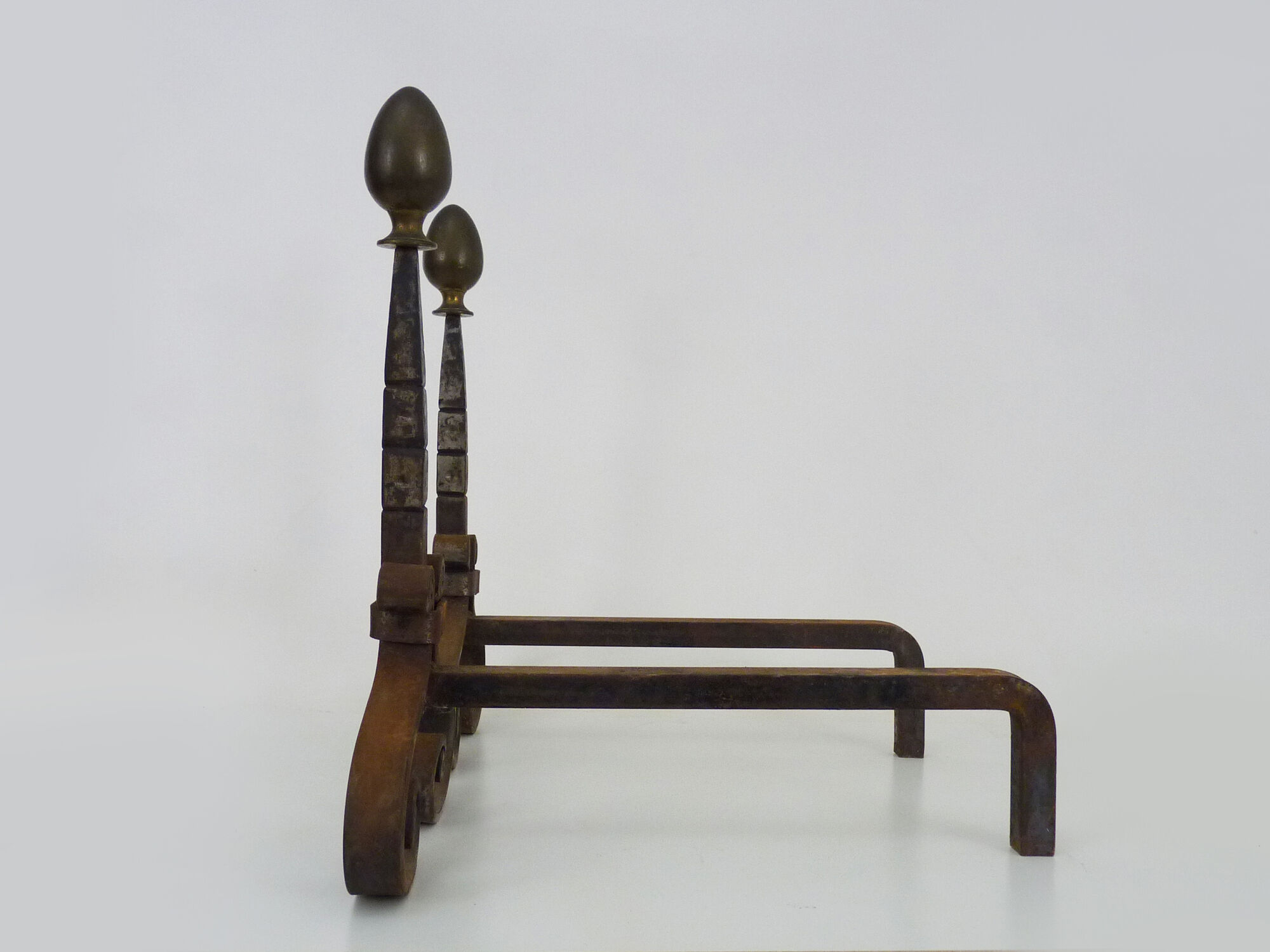 Pair of cast iron, wrought iron and brass chimney chenets. france 19th century