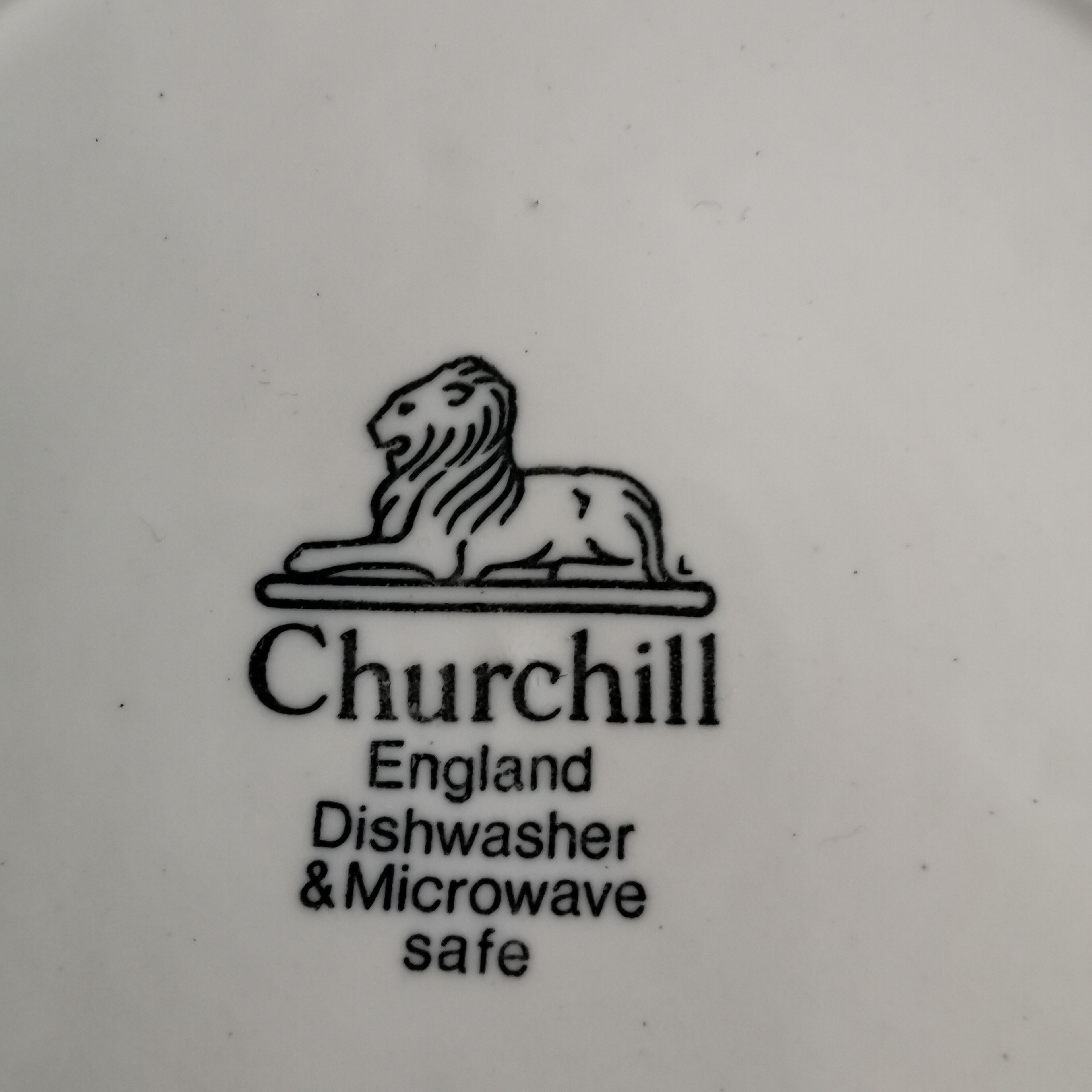 Old flat plate stamped Churchill. English manufacturing