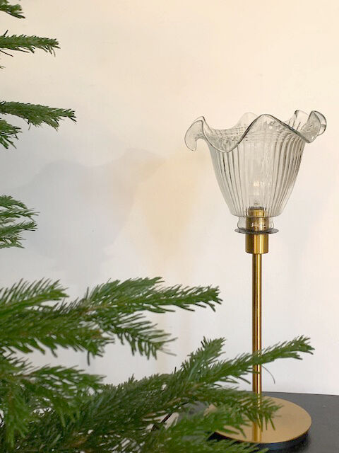 Table lamp with a vintage antique globe in ridged glass mounted on gilded stand