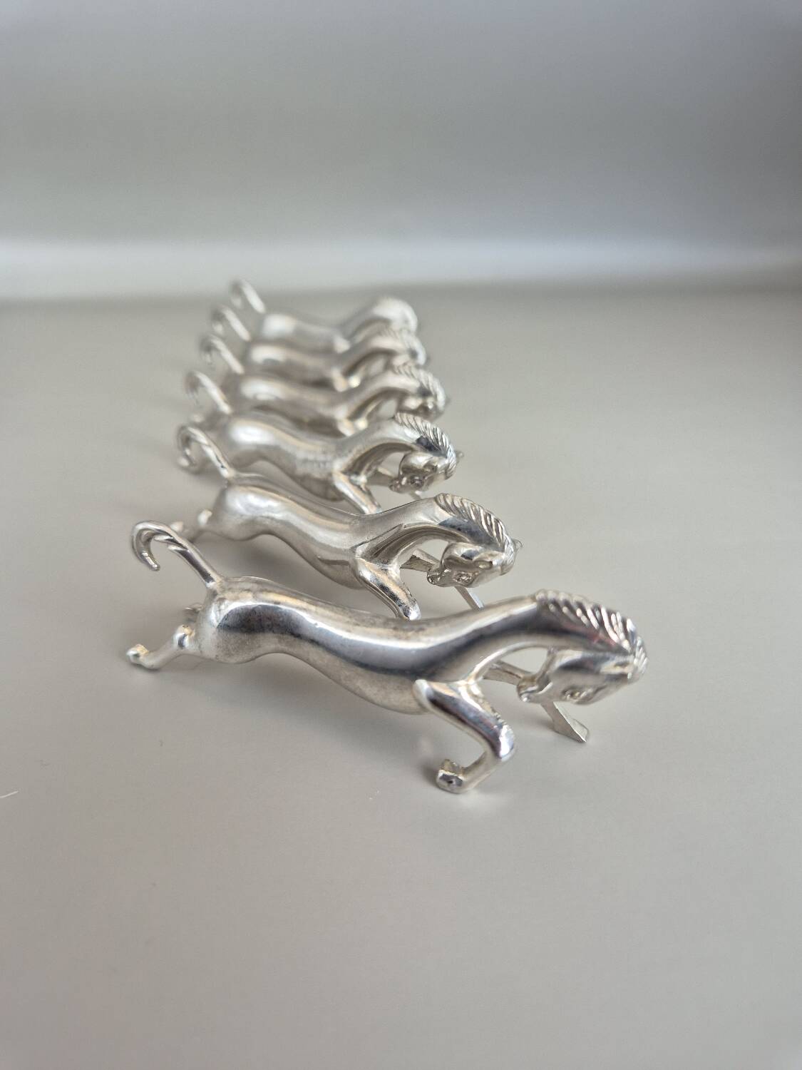 Set of 6 vintage silver metal knife rests - horse motif