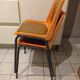 Chairs orange plastic shells seats and backrests imitation leather
