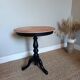 Marquetry pedestal table with black legs