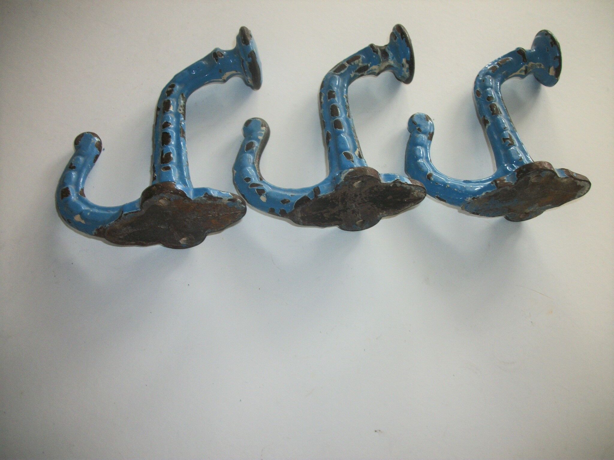 Set of 3 swaddled cast iron hooks