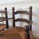 Paire de fauteuils en bois et paille  Charles Dudouyt 