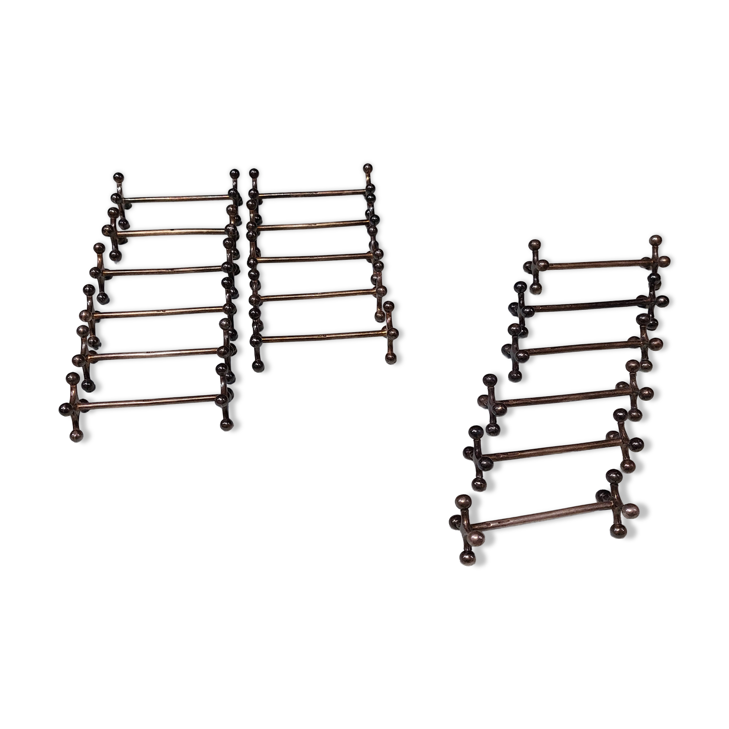 17 Christofle silver-plated knife rests in the Atonium model.