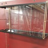 Wall-mounted Tomado showcase 1960