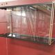 Wall-mounted Tomado showcase 1960
