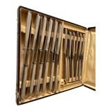 Box of silver metal knives