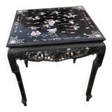 Chinese black lacquer side table with multicoloured inlays, 1950s.