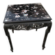 Chinese black lacquer side table with multicoloured inlays, 1950s.