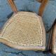 Two Louis Philippe cane chairs in solid carved wood from the 20th century