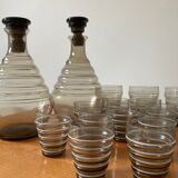 Service of glasses, cups, decanters of the 50s in smoked glass