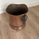 Old copper pot cover