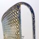 Vintage perforated metal armchair from the 1950s.