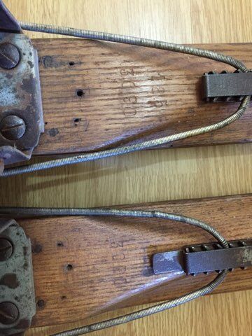 Wooden skis and vintage bamboo sticks