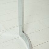 Dining table with a circular base.