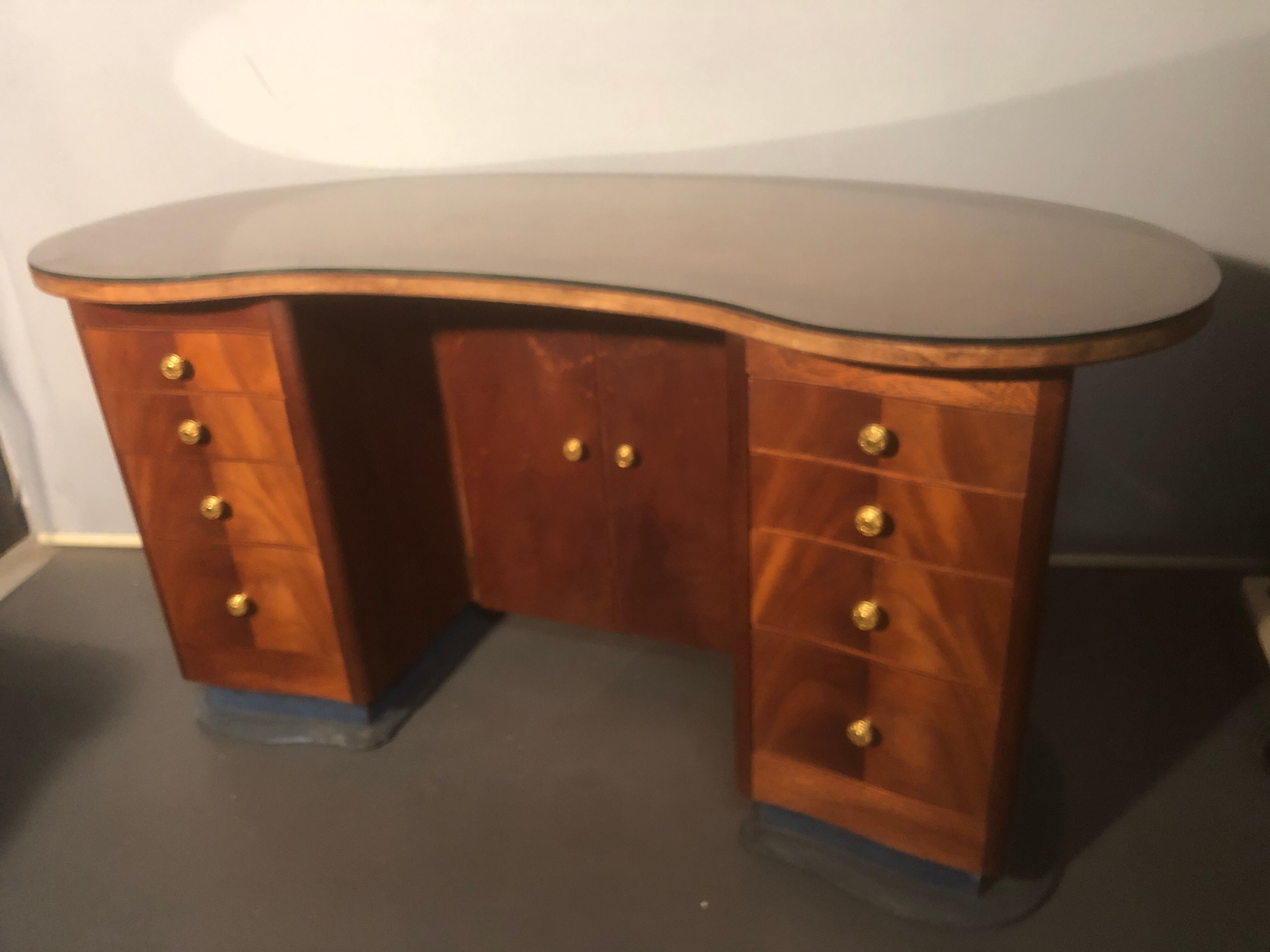 1940 desk in kidney shape with 8 drawers, 2 doors and footrest royere style