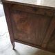 Curved chest of drawers in rosewood and marble marquetry