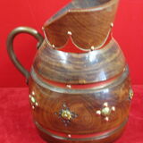 Wooden pitcher and vintage copper decoration