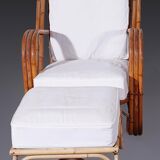 Pair of rattan armchairs with this ottoman by Audoux Minet, 1960