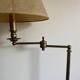 Reading lamp, floor lamp, adjustable arm lamp.