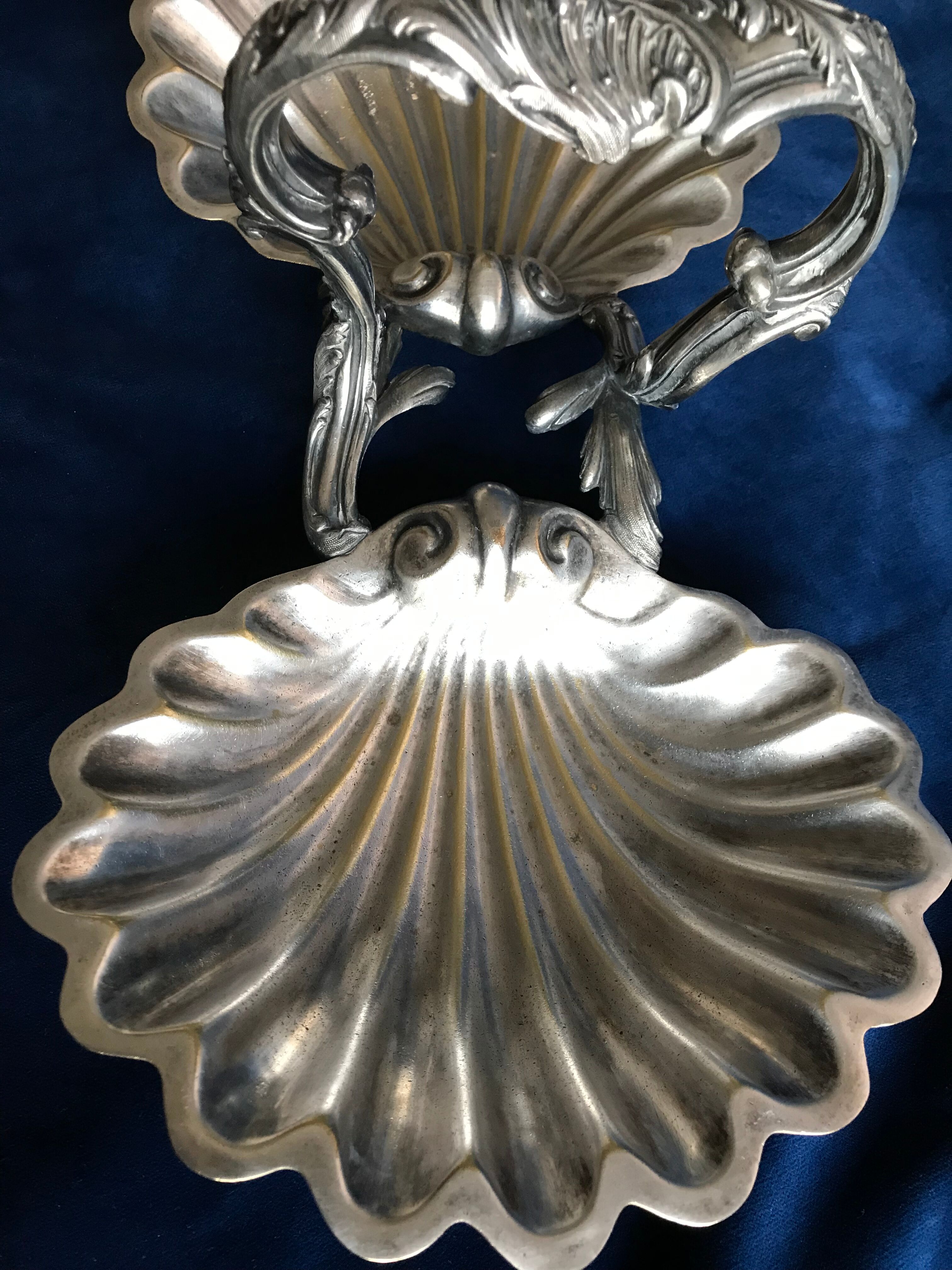 Old beggar in silver bronze