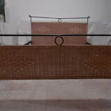 Black metal and rattan bed frame