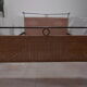 Black metal and rattan bed frame