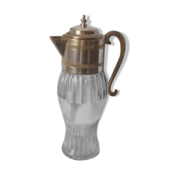 Jug with a glass body and silver-plated metal.
