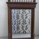 Large mirror beveled Henri II style varnished and carved wooden 128 x 92 cm