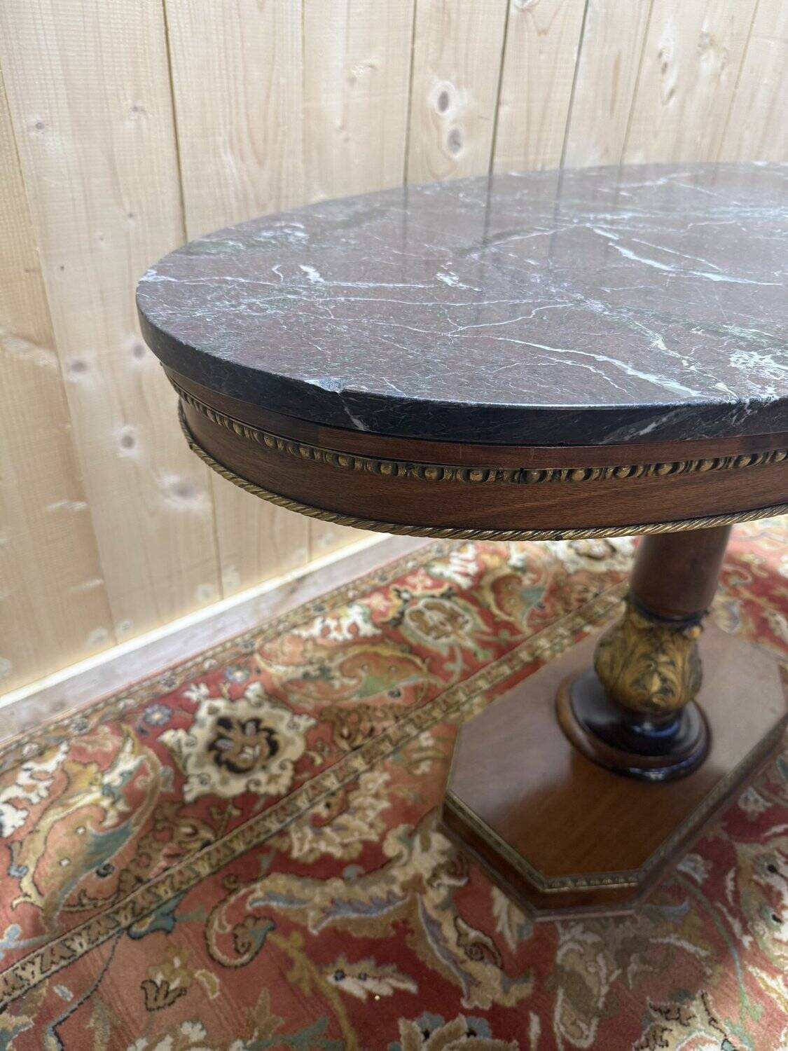 Oval Empire-style gueridon in walnut and marble.