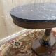Oval Empire-style gueridon in walnut and marble.