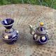 Vase and small teapot in cobalt blue enameled ceramic with artisanal and oriental pewter inserts