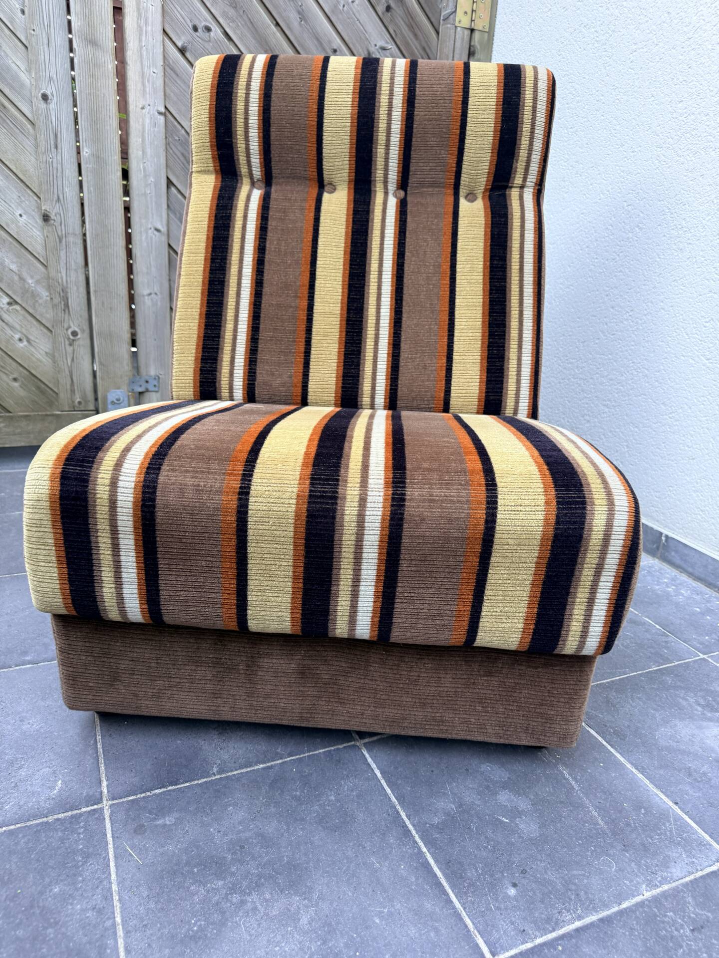 Vintage 1970s lounge chair – striped orange, brown, and cream velvet