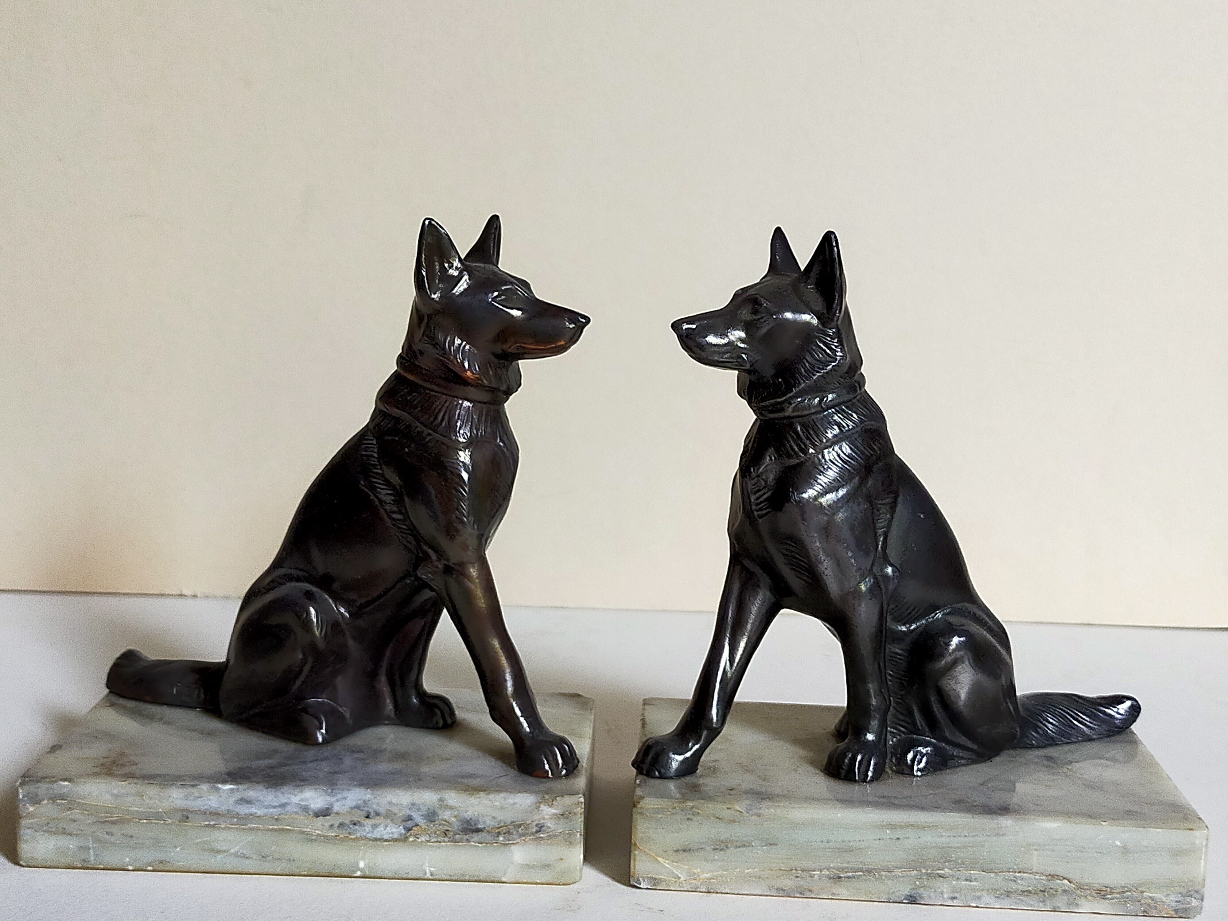 Pair of Art Deco bookends to signed wolf dogs
