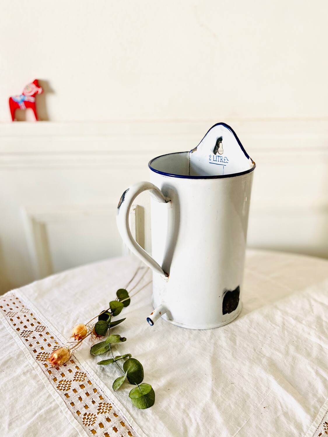 Old medical fountain in white enameled sheet metal